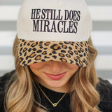 He Does Miracles Trucker Hat