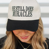 He Does Miracles Trucker Hat