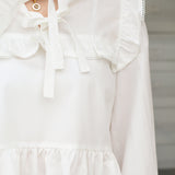 Eyelet Peplum Top