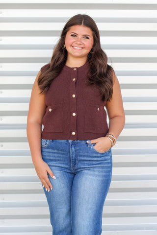 sweater vest with gold buttons