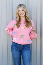 Loving all the Bows Sweater