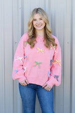 Loving all the Bows Sweater